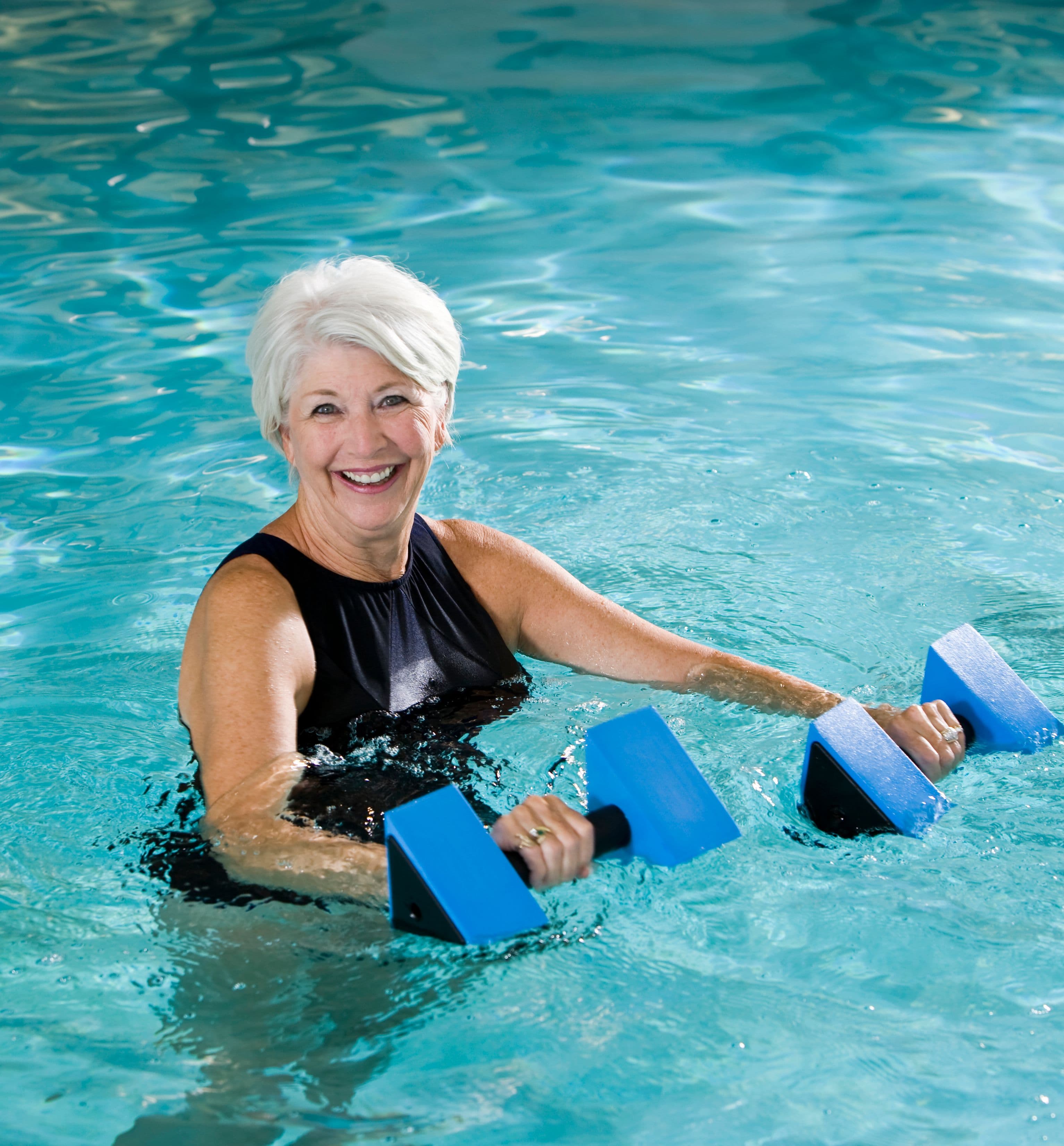 woman doing water aerobics