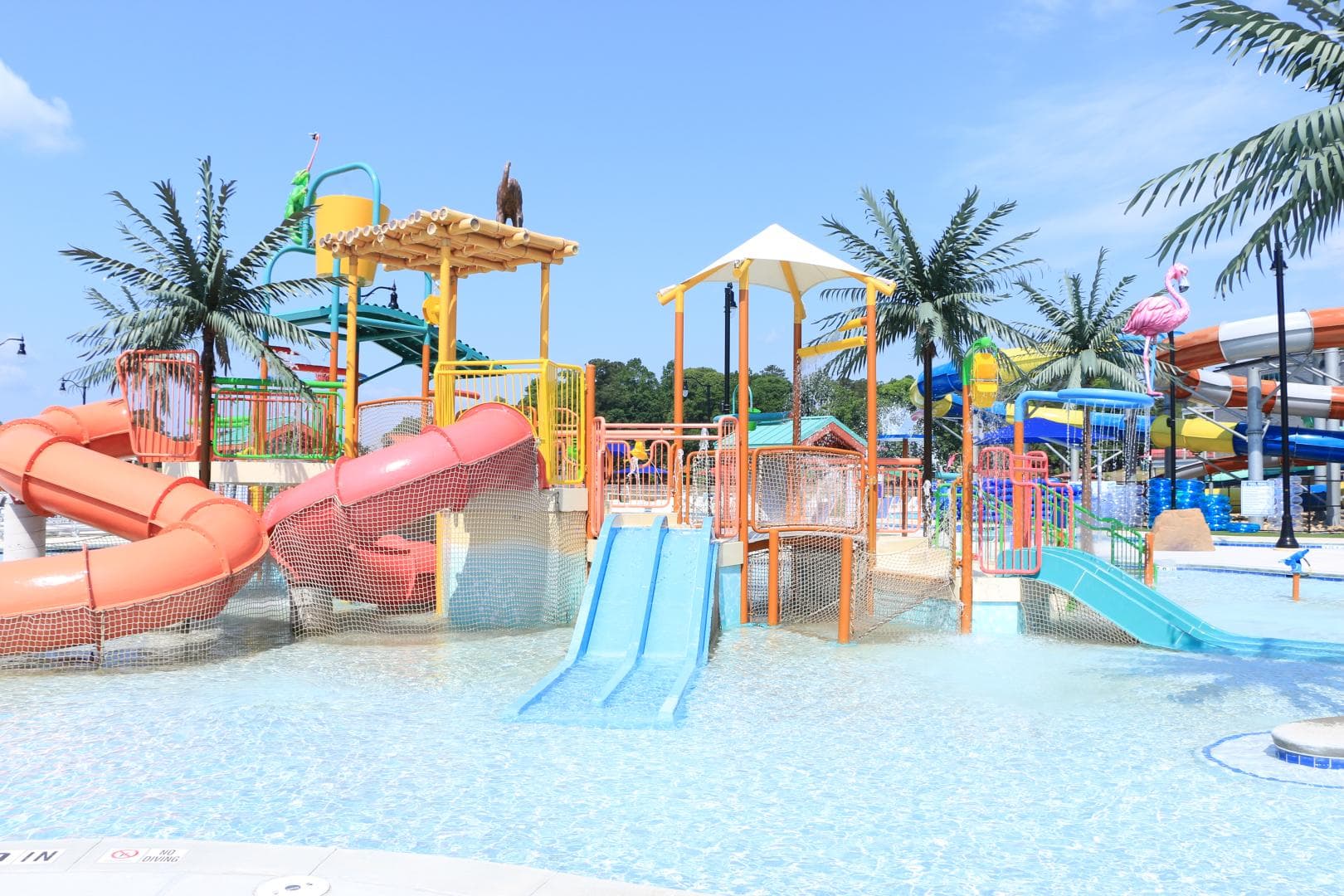 Jungle gym in swimming pool with slides
