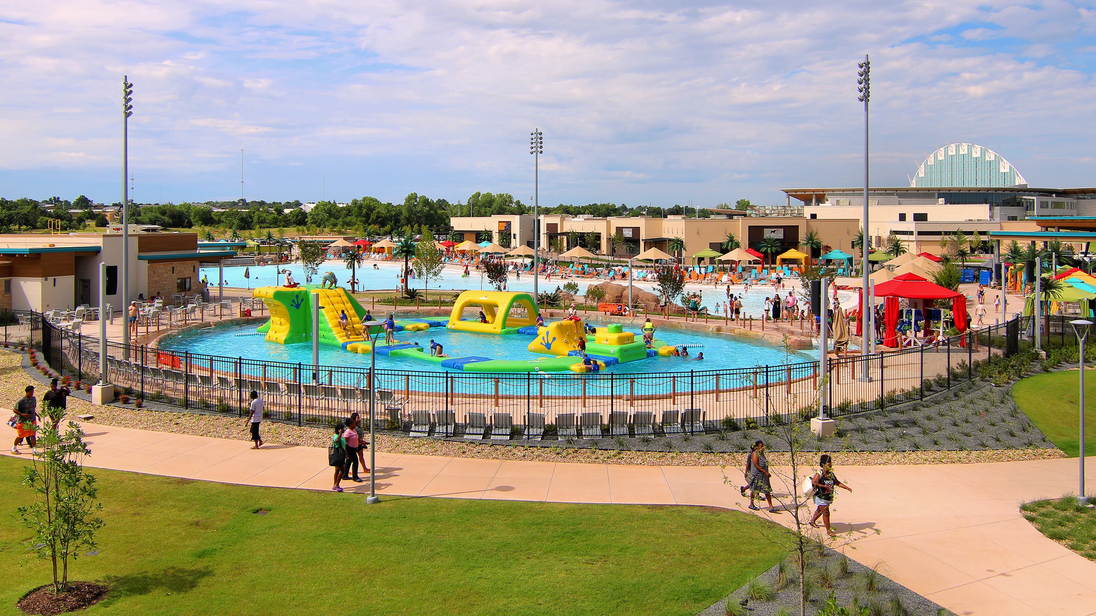Indoor water park resort slides and wave pool under a roof